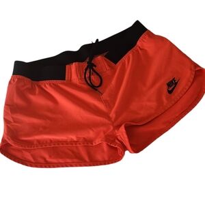 Nike Neon Orange Silky Running Shorts. Size M
